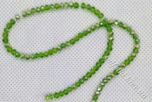Намистини скляні грановані гальваніка АВ зелені рондель 3х2 мм