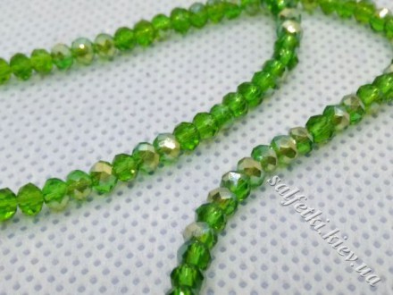 Glass beads faceted galvanic AB green rondel 3x2 mm
